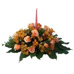 Centerpiece with seasonal flowers and candles